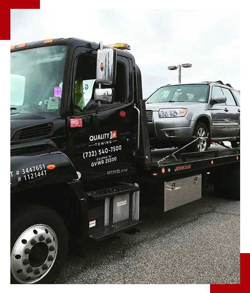 Quality 1st Towing's Flatbed Tow Truck Providing Long Distance Towing Service in Newark NJ